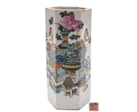 A Chinese porcelain lantern or hat stand: of pierced hexagonal form enamelled in colours with household objects, finger citro