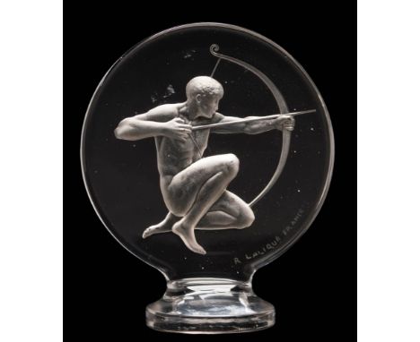 A Lalique glass 'Archer' car mascot: the kneeling naked archer drawing his bow, etched 'R.Lalique France' and model no.1126, 