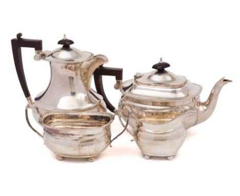 An Elizabeth II silver  four-piece tea and coffee service, maker Adie Brothers, Birmingham, 1962: of barge-shaped design with