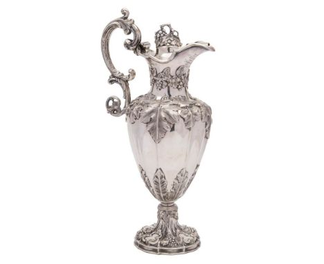 A Victorian silver wine ewer, maker Henry Wilkinson &amp; Co, Sheffield, 1855: inscribed, of ovoid form with domed hinged lid