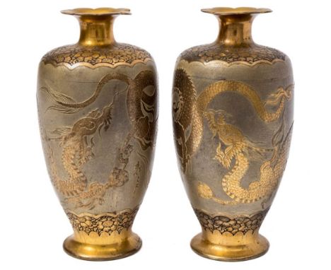 A pair of Japanese Komai-style damascene ware vases: of ovoid outline, each decorated with dragons chasing pearls, with petal