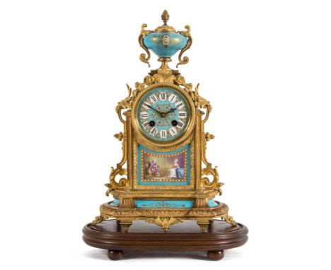 A 19th century French gilt-metal and porcelain mantel clock: the eight-day duration movement striking the hours and half-hour