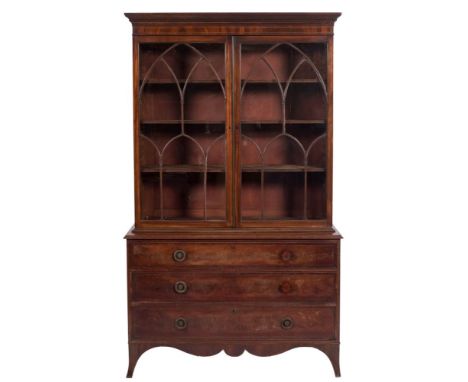 A 19th Century mahogany and inlaid bookcase:, bordered with boxwood and ebony lines, the upper part with a moulded dentil cor