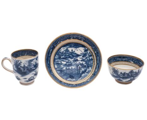 A Caughley blue and white trio: printed with the chinoiserie 'Fence and House' pattern within gilt line and dot borders, coff