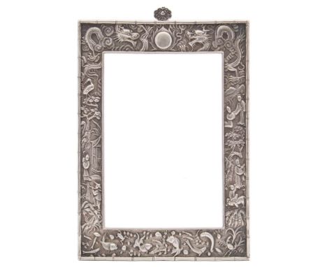 A Chinese silver photo frame, maker KMS: of rectangular outline, decorated with fish, figures, birds and dragons within bambo