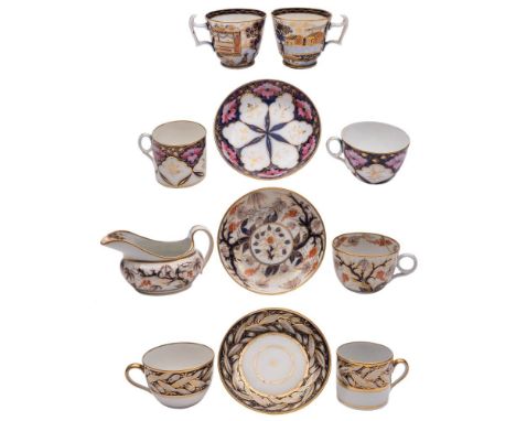 A group of New Hall hardpaste and bone china tea and coffee wares: in underglaze blue and gilt tree and foliage decoration in