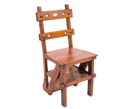 A Victorian oak metamorphic library step chair,: the back with pierced bar top rail and horizontal splat, having a hinged sea