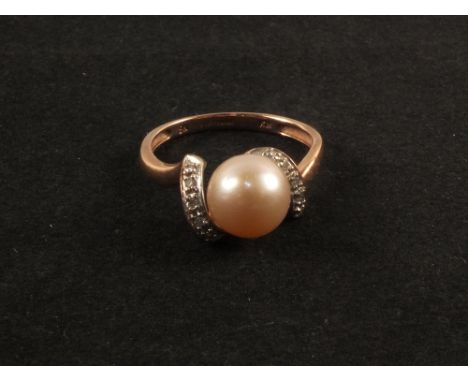 A 9ct gold pearl and diamond ring, size K