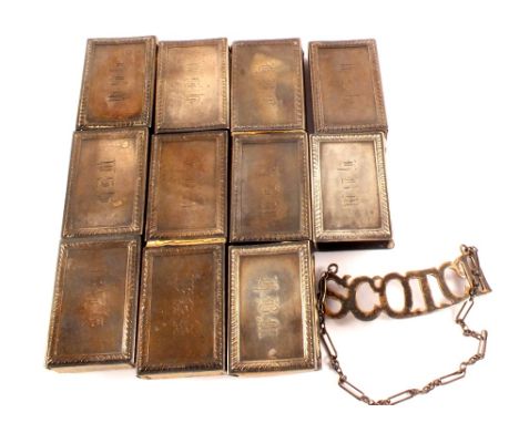 Eleven silver matchbox holders, stamped Sterling with initials engraved plus a silver Scotch label