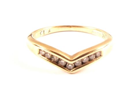 A 9ct Gold diamond set wishbone ring, size K