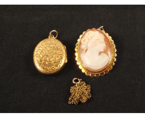 A 9ct gold oval photo locket, a 9ct gold framed cameo pendant with a yellow metal chain