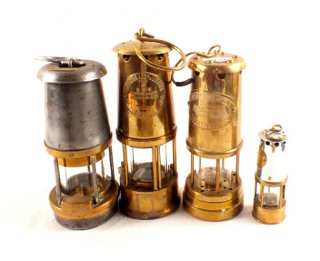 A 'Wolf' safety miners lamp, William Maurice plus three others