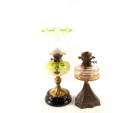 A Victorian brass column oil lamp with painted green glass bowl and etched shade plus one other with iron base