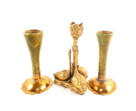 A pair of Victorian Arts and Crafts brass and green ceramic candlesticks plus a Victorian swan candlestick