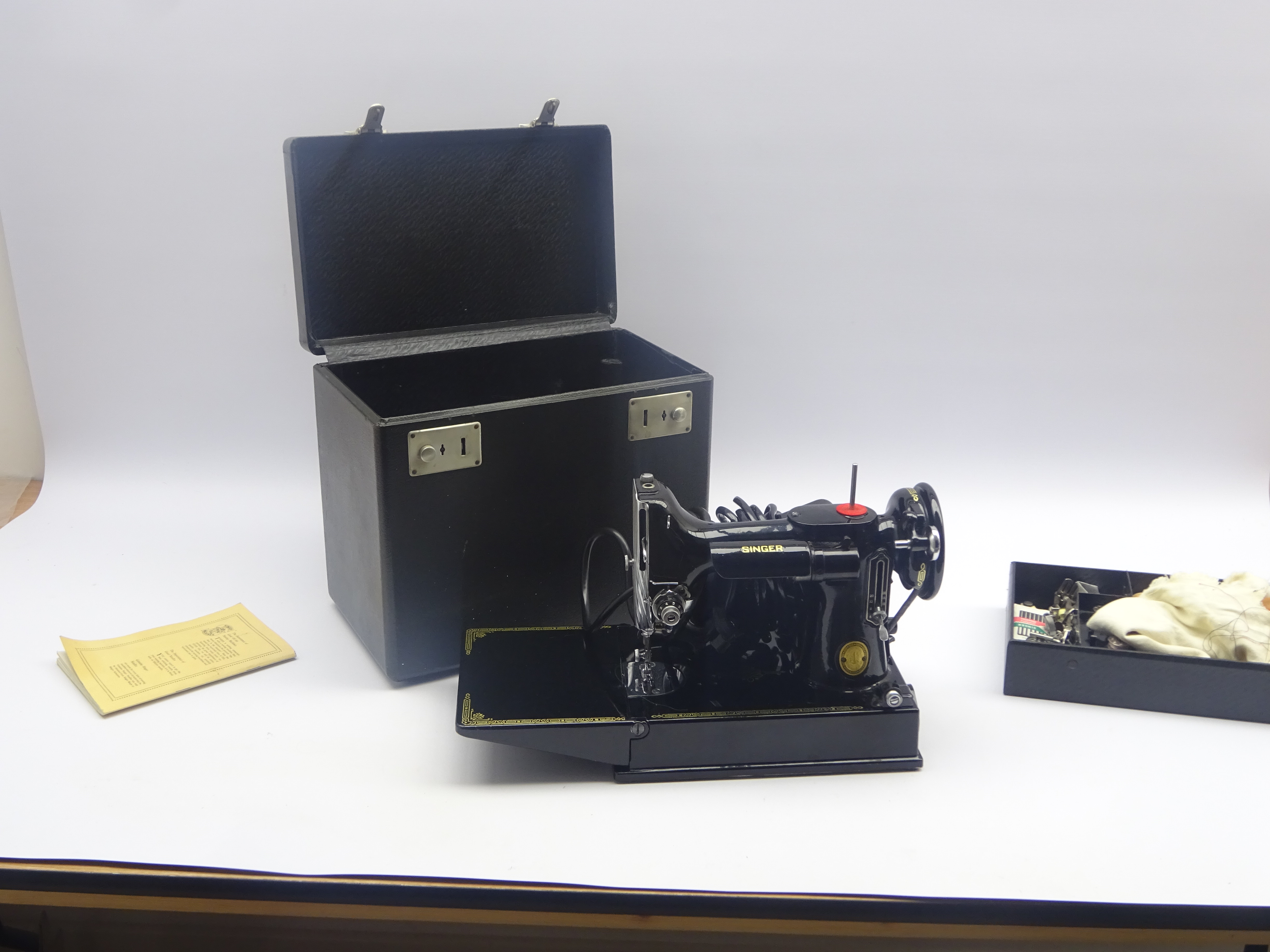 Vintage Singer electric sewing machine, probably Featherweight model