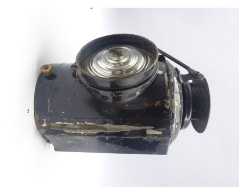 Adlake non-sweating lamp for railways, of black painted cylindrical form with bulls-eye glass H30cm excluding swing handle Co