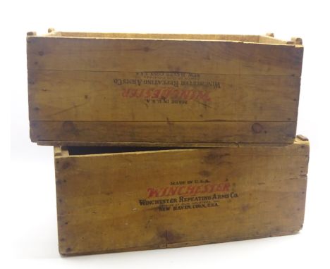 Two open pine ammunition boxes, each stamped 'Made in USA Winchester Repeating Arms Co. Division of Olin Industries Inc. New 
