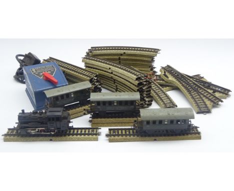 Marklin 'H0/00' gauge - electric 0-6-0 locomotive No.89005, three tin-plate passenger coaches and quantity of tin-plate track