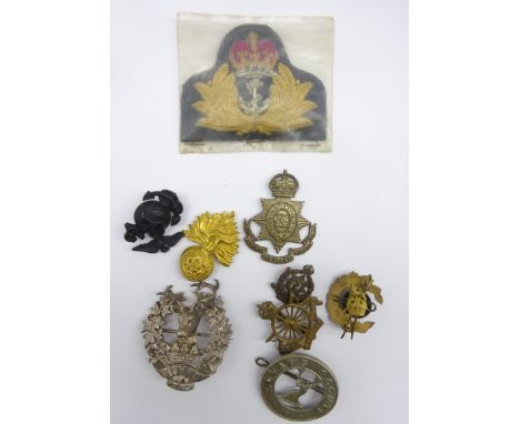 Eight military badges including 6th Volunteer Batt. Gordon Highlanders Glengarry/Plaid brooch, Lovat's Scouts, Indian Medical