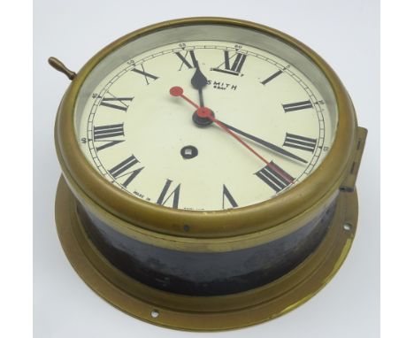 Smiths ship's brass cased bulkhead clock, the painted 16cm dial with Roman numerals and centre sweep seconds hand, inscribed 