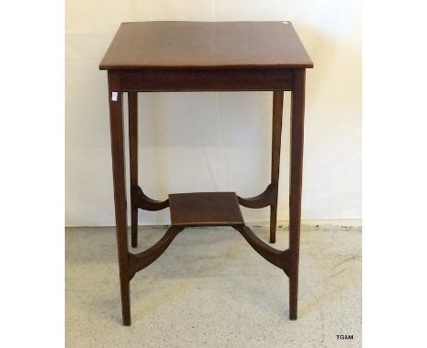 A mahogany square lamp table with centre base on tapered legs 72 x 50 x 50cm