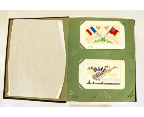 A postcard album containing 17 WW1 silk postcards including Royal Marine Light Infantry & Flying Corps with 40 other vintage 