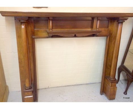 A 1920's mahogany fire surround 133 x 170 x 28cm