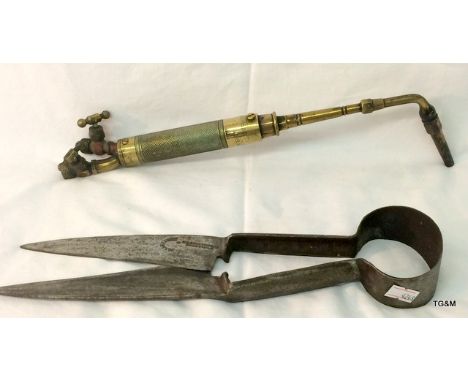 A brass blow lamp torch head and pair of sheep shearing scissors 
