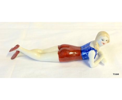 An Art Deco pin doll ceramic figure
