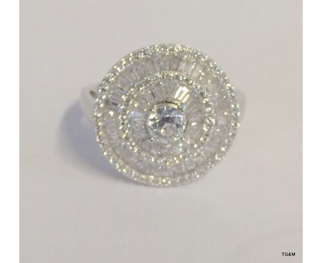 A silver and Chanel set Cz dress ring