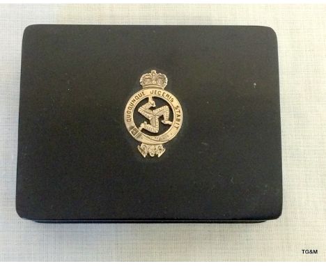 Lacquer snuff box inset with silver Isle of Man badge