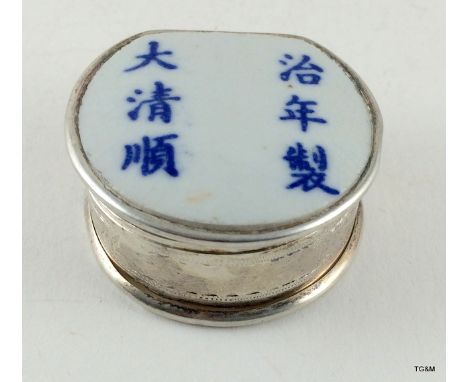 A silver and enamel Chinese pill box