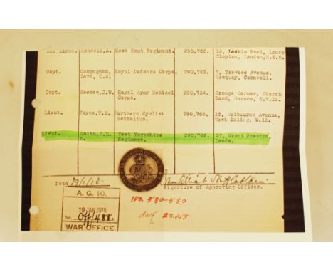 A WW1 Silver War Badge numbered B290766 which was awarded to Lieutenant JLW Smith of the West Yorkshire Regiment. With a copy