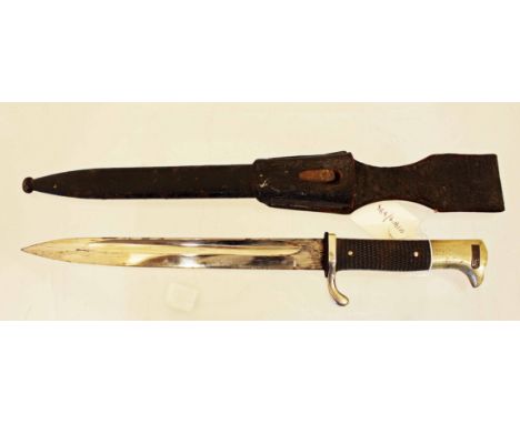 A 3rd Reich knife bayonet in its steel scabbard with leather frog 40cms long overall