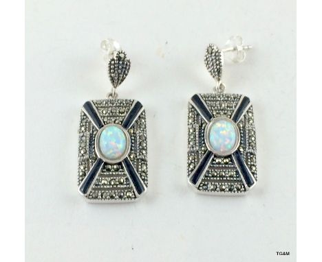 A pair of silver marcasite and opal drop earrings