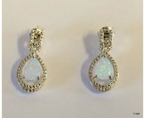 A pair of silver Cz and Opalite drop earrings