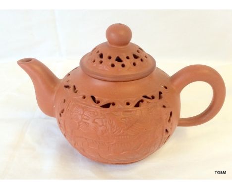 Chinese terracotta teapot with marks to the base