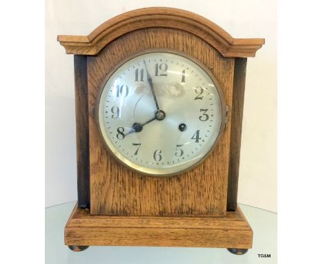 A Oak Mantle Clock Complete with Pendulum 