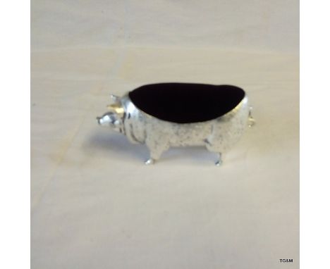 A large continental silver stamped 800 pig pincushion