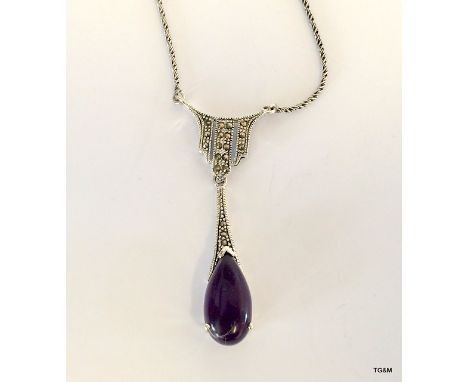 A silver marcasite and amethyst drop pendant necklace