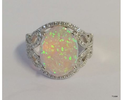 A silver Cz and Opalite dress ring