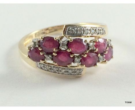 9ct gold ladies diamond and ruby ring size o