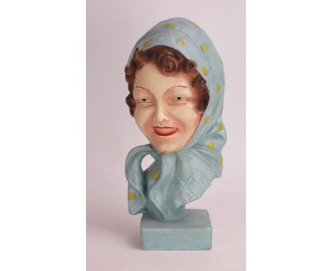 A Plaster Model of a females head with scarf, 28cm 