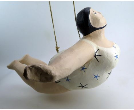 'The Starry Bather', a papier-mâché humorous model of a lady in a starfish costume with bathing hat, to be suspended for disp