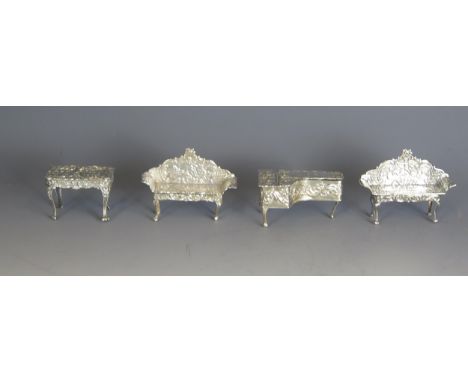 A collection of silver miniature furniture, various makers and dates, includes spinet, sofas,  72gms, 2.33ozs(4) 