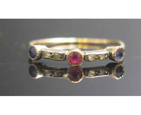 An Antique Ruby, Sapphire and Diamond Ring in a precious yellow metal setting, size M.5, .85g 