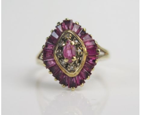 A 9ct Gold, Ruby and Diamond Ring, 16.8x13.7mm head, sizeM.5, hallmarked, 3.14f 