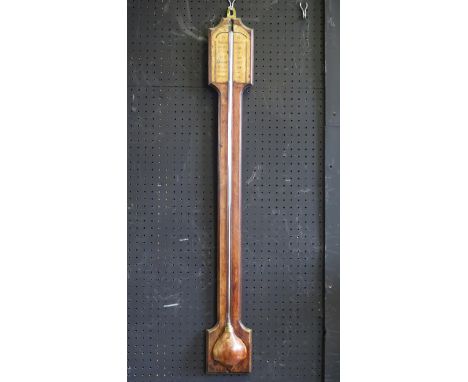 An 18th century style stick barometer, of arched outline with moulded borders, and paper scale, 92cm high. 