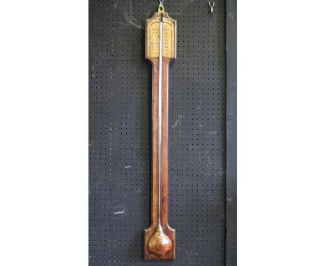 An 18th century style stick barometer, of arched outline with moulded borders, and paper scale, 92cm high. 