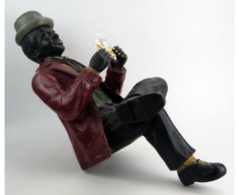 A Modern Model of a Card Player to be displayed on the edge of a ledge, c. 61ch high 